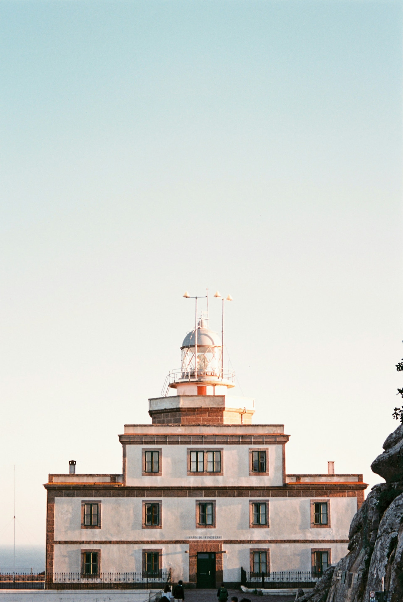 The lighthouse of Fisterra rising over the Atlantic, the end of the Camino